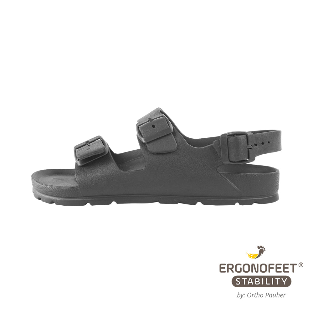 A imagem mostra o Sandália ortopédica Ergonofeet Stability, vista na lateral, na cor preta