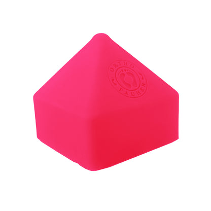 Produto massageador, na cor pink, no formato triângular