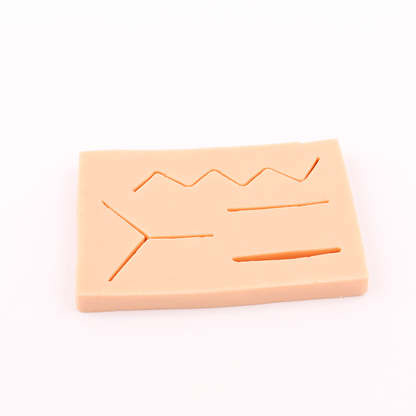 Simulador de pele para treinamento de sutura - Modelo (145x100x15mm)