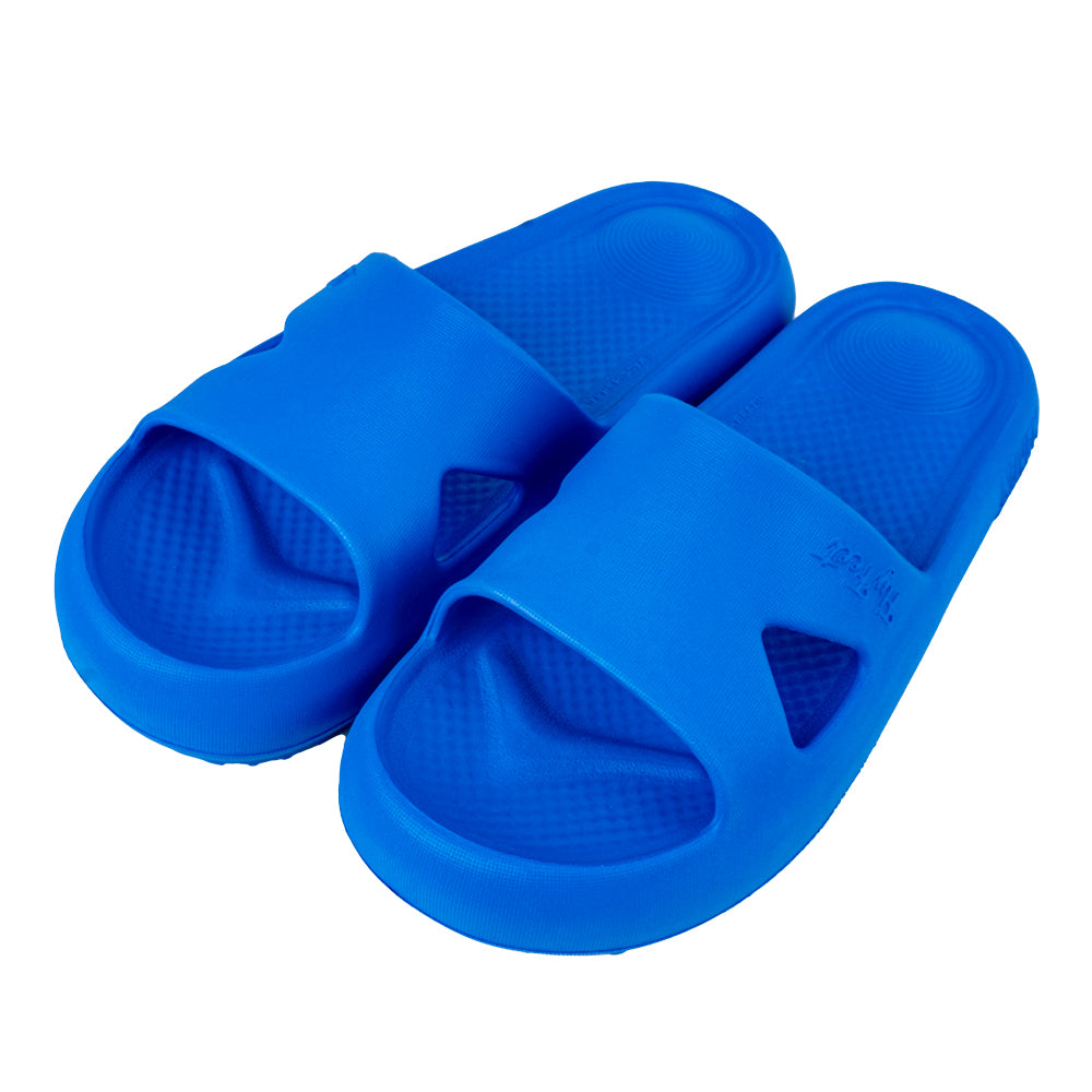 Par de sandálias ortopédicas para esporão na cor azul. Posicionada de perfil, destacando a abertura lateral para acomodação do joanete.
